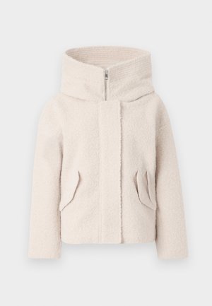 Light beige, textured fleece jacket with a high collar, front zipper, and two side pockets. Features a relaxed fit and soft fabric.
