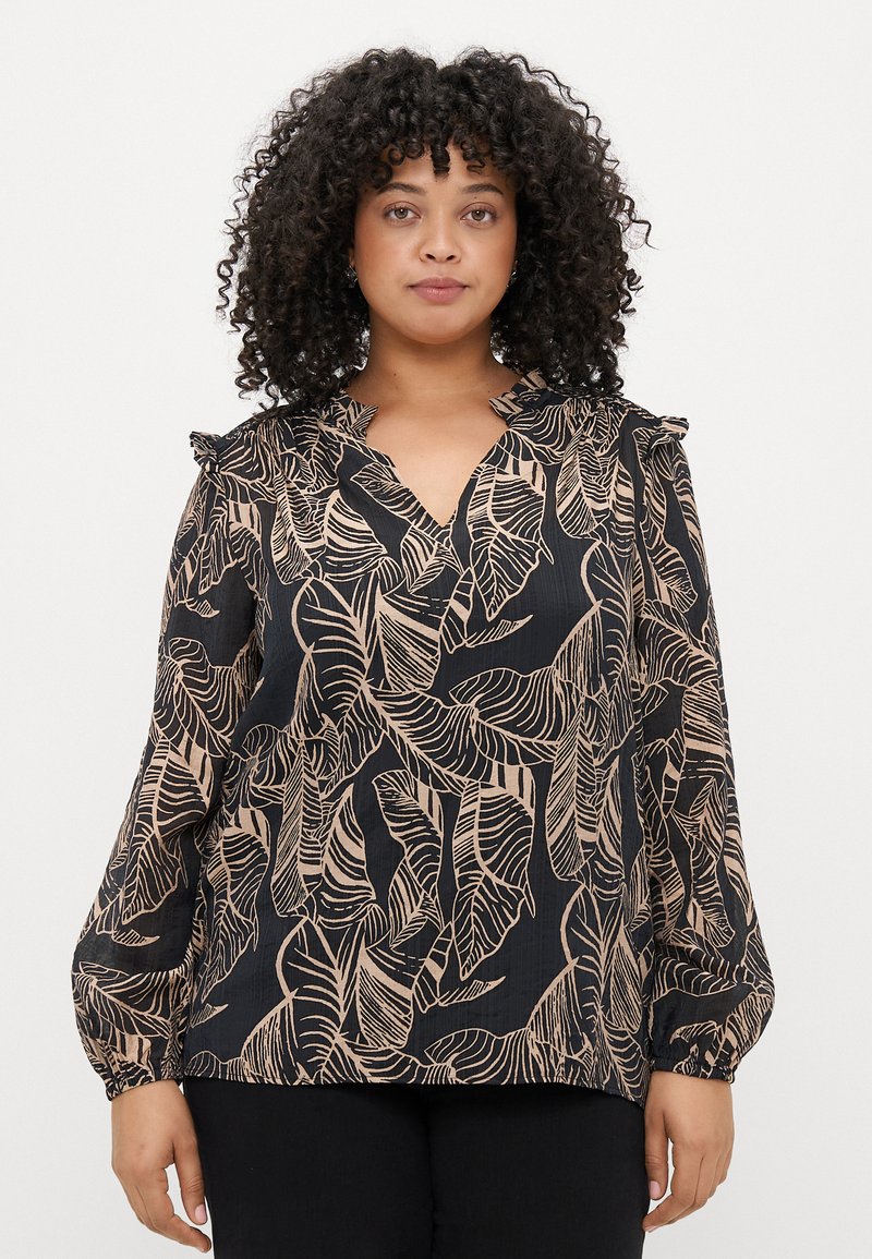 Blusa preta com padrão de folhas em bege, apresentando um decote em V e detalhes de babados nos ombros. Mangas longas, franzidas, com punhos.