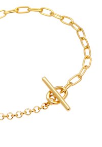 Pulsera de cadena color dorado que presenta eslabones alargados y redondos, con un cierre de tipo toggle y acentos circulares para el cierre.