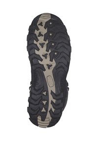 Suola in gomma nera con scanalature profonde e accenti grigi. Presenta un design a motivi per una migliore aderenza e durata.