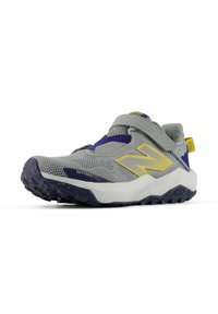 Gray athletic shoe with mesh upper, yellow and blue accents, reinforced toe cap, and a textured black outsole with yellow speckles.