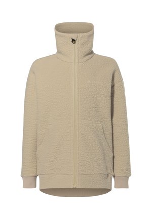 Beige fleece-takki, jossa on korkea kaulus, täysi vetoketju, etutaskut ja ribbikuvioidut hihansuut. Pehmeä tekstuuri, jossa on hieman pörröinen pinta.