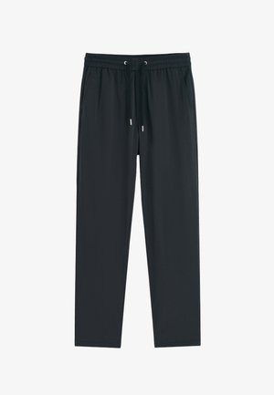 Pantalon décontracté noir avec ceinture élastique et cordon, coupe droite et poches latérales.