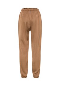 Brune, lette bukser med elastisk talje, smal ben design og indsamlede ankelslutter; glat tekstur med minimale detaljer.