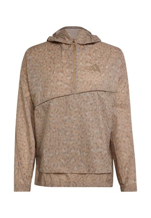 Lightweight hooded sweatshirt in tan with a subtle leopard print. Features a half-zip front, long sleeves, and a relaxed fit.