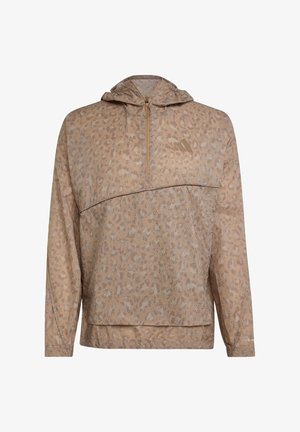 Lightweight hooded sweatshirt in tan with a subtle leopard print. Features a half-zip front, long sleeves, and a relaxed fit.