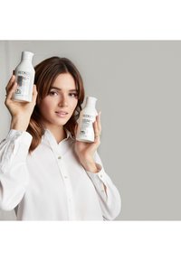 Redken ACIDIC BONDING CONCENTRATE CONDITIONER - Après-shampoing