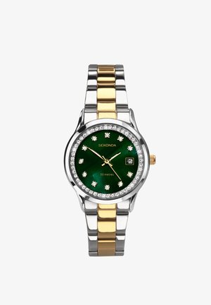 Montre en métal argenté et doré avec un cadran vert foncé, des marqueurs en cristal et un affichage de la date, entourée d'une lunette semblable à un diamant.