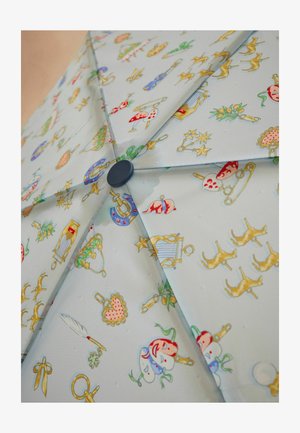 Parapluie bleu clair avec divers motifs colorés, y compris des icônes comme des ciseaux, des étoiles et des masques, présentant un bouton central noir.