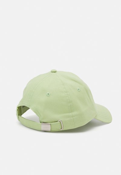 Green cotton cap with a curved brim, adjustable strap at the back, and visible stitching details. Smooth texture and simplistic design.