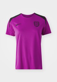 Purple Nike sports jersey with black shoulder accents and the England crest on the chest. Made of breathable fabric, featuring a crew neck design.