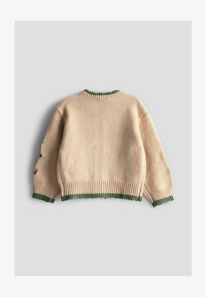 Kreminė megzta palaidinė su žaliais raukiniais ant rankovių ir apykaklės. Su šiek tiek žydinčių siuvinėjimų ant rankovių, tekstūruota medžiaga. Laisvas siluetas.