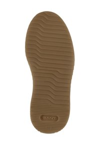 Podešev tenisky, hnědá guma s texturou vlnitých drážek pro lepší přilnavost. Přítomné označení: "GANT" a velikost "37" vyražena poblíž paty.