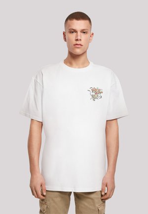 White cotton t-shirt with short sleeves, featuring a colorful graphic of a cartoon character on the left chest area.