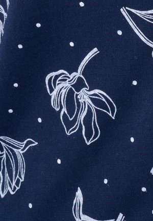 Navy fabric with white floral pattern featuring open flowers and leaves, interspersed with small white dots for added texture.