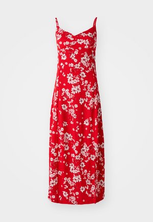 Punase lilledega midi kleit valgete lillede mustritega, V-kujuline kaelus, reguleeritavad rihmad ja tekstuuriga kangas.