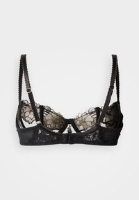 Black lace bra with sheer panels, floral embroidery in gold and black, adjustable straps, and a front closure featuring a gold accent.
