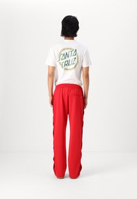 Champion Rochester BUTTON PANT UNISEX - Tepláky - red