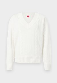 Maglione bianco lavorato a maglia con scollo a V, orlo a coste e motivi a trecce testurizzati con il nome del marchio delicatamente intrecciato nel tessuto.