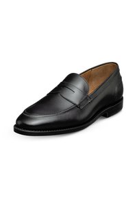 Mocassin en cuir noir avec une finition lisse, bout rond et couture décorative sur le dessus. Doublure intérieure marron et talon plat.
