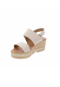 Sandali a tacco wedge beige con base in espadrilles testurizzata, dotati di doppie fasce incrociate e punta aperta, realizzati in materiale sintetico.