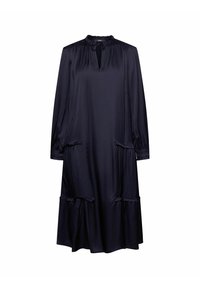 Mörkblå midiklänning i mjukt tyg. Har ett samlat halsband, långa ärmar och ytlig volanger vid nederkanten och fickorna.