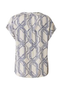 Blusa a maniche corte color crema con stampa geometrica blu, caratterizzata da una vestibilità comoda e un leggero dettaglio di piega sul retro.