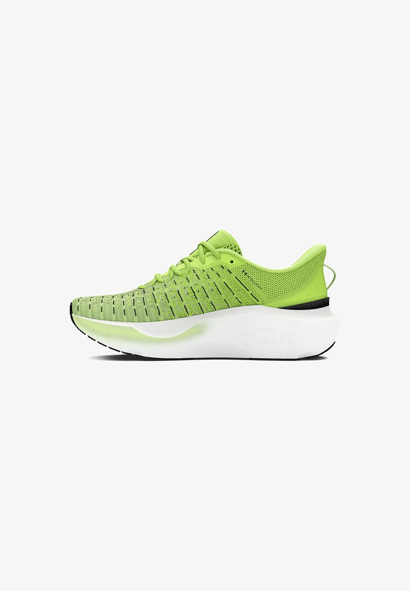 Lime green athletic shoe with a breathable mesh upper, black accents, thick white sole, and textured detailing for grip and support.