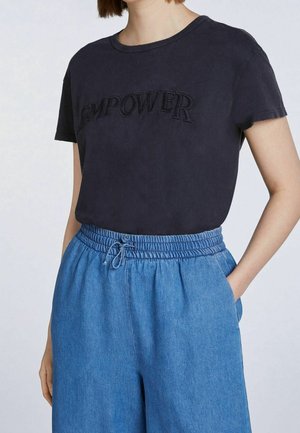 T-shirt med print - black