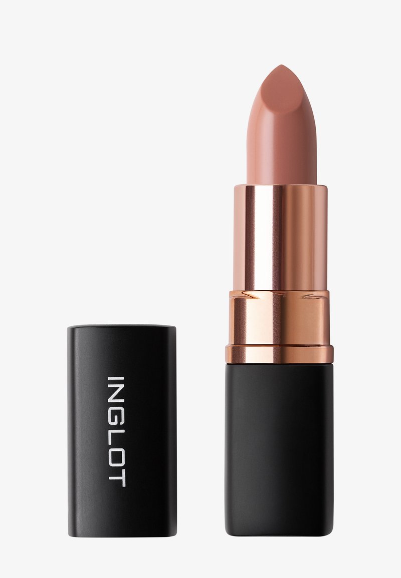 Rouge à lèvres dans un étui noir et rose doré. La mine est d'une nuance nude douce avec une pointe arrondie. Le tube présente une finition mate.