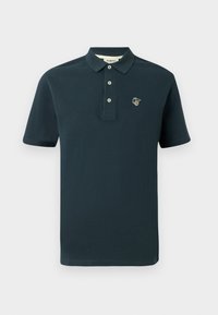 Mørk marineblå polo skjorte laget av bomull, med klassisk krage, tre knapper i placket og en liten brodert logo på brystet.