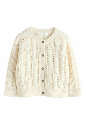 Cream knit cardigan featuring a textured pattern, round neckline, and five button closure with silver-toned buttons. Textured fabric throughout.