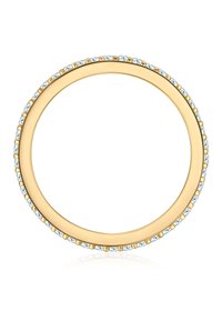 Bracelet circulaire en or avec une finition lisse et une rangée de petites pierres claires le long du bord, créant un détail d'accent étincelant.