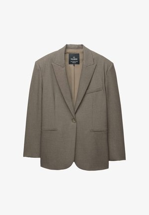 Ruskea bleiseri, jossa on rakenteelliset hartiat, yksittäinen nappikiinnitys ja viilto-lapelit. Sisältää kaksi etutaskua ja sileän sisävuoren.