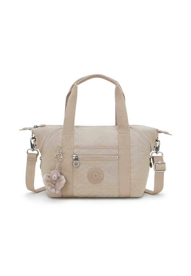 Beige Handtasche mit doppelten Griffen und verstellbarem Schulterriemen, ausgestattet mit einem strukturierten Muster, einer Reißverschlussfronttasche und einem flauschigen Affenanhänger.