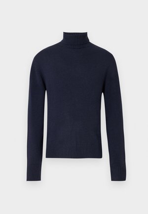 Pull col roulé bleu marine en tissu tricoté. Il présente un col et un ourlet côtelés, des manches longues et une coupe classique.