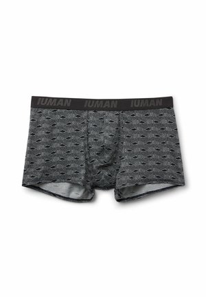 Graue Herren-Boxershorts mit schwarzen Haifischmustern und einem schwarzen Bund mit dem wiederholten Markennamen "IUMAN."