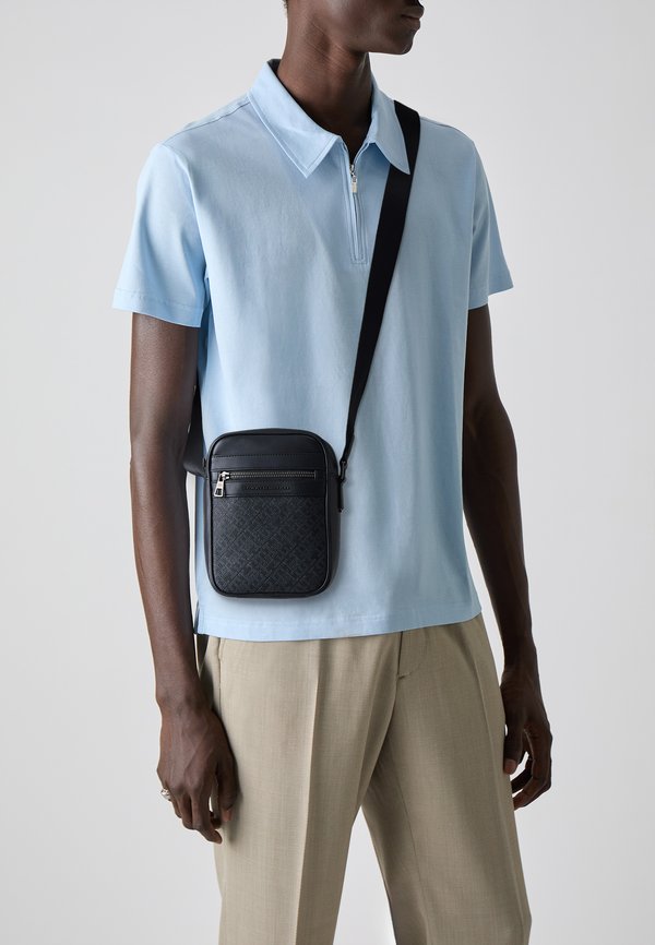 MONOGRAM MINI REPORTER - Cross body bag