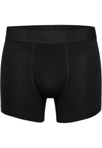 Zwarte boxer shorts van rekbaar materiaal met een zachte, elastische band die verhoogde letters bevat. Strakke pasvorm zonder zichtbare naden.