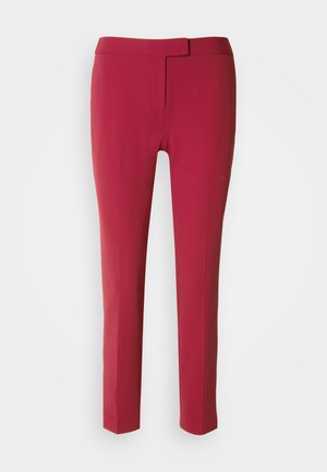 Røde skreddersydde bukser med en glatt tekstur, slim fit og flat front. Designet med et smalt liv og uten synlige lommer.