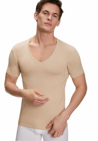Beige short-sleeve V-neck t-shirt in a soft fabric. Features a tailored fit and minimal stitching detail, suitable for layering.