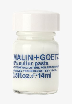Weißes Glasgefäß mit glänzendem weißen Deckel, etikettiert mit blauer Schrift, die 10% Schwefelpaste für zu Unreinheiten neigende Haut angibt. Volumen: 0,5 fl oz.
