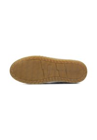 Semelle de chaussure en caoutchouc avec une finition texturée en gomme. Présente des motifs en relief et un rectangle central pour une meilleure adhérence et durabilité.