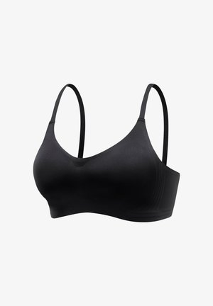 Black wireless bra with a smooth, stretchy fabric. Features thin adjustable straps and a scoop neckline, designed for a seamless fit.