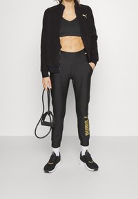 Puma Träningsjacka - black