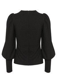 Blusa nera con maniche a sbuffo, silhouette aderente, tessuto testurizzato e cerniera nascosta sul retro. Polsini lunghi e stretti arricchiscono il design.