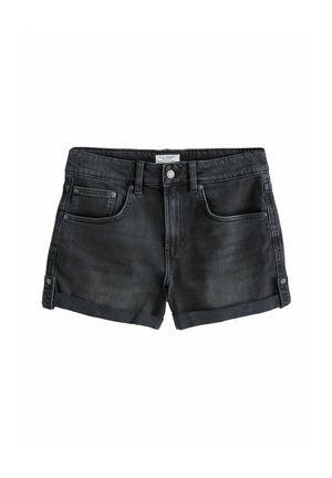 Mustmustelged denim lühikesed püksid keskmise kõrgusega vöökohaga, ees taskud ja rullitud servad. Omaduseks nupplukustus ja vööpaelad. Sile tekstuur.