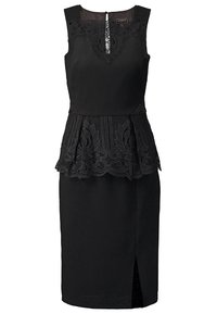 Robe noire sans manches avec détails en dentelle sur le corsage et taille peplum, avec une fente devant et un panneau transparent au niveau du décolleté.