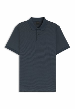 Dark blue polo shirt made of textured fabric, featuring a classic collar, three buttons, and short sleeves with solid trim.