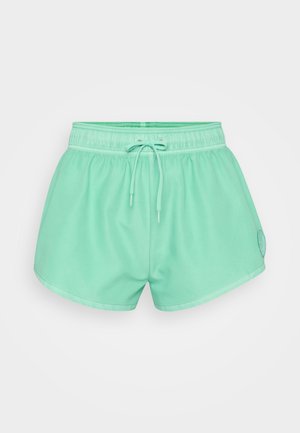 Mäta zelené plavky s elastickým pásom a šnúrkou. Sú vybavené okrúhlym logom na boku. Hladká, ľahká tkanina.